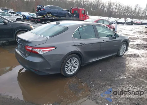 2019 Toyota Camry Hybrid Xle z USA, uszkodzony, nr VIN 4T1B21HK1KU517099